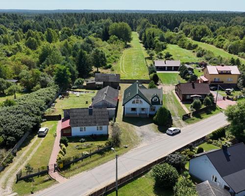 Budynek Handlowo-mieszkalny z dużą działką 6500m2