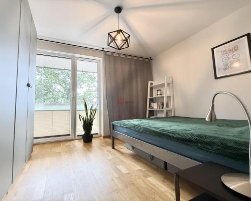 Komfortowe 2-pokojowe mieszkanie w apartamentowcu Baranówek