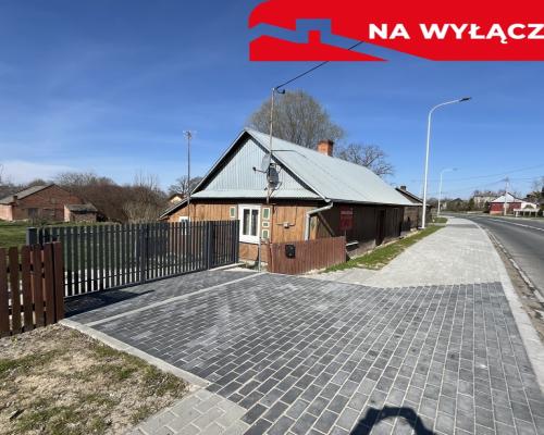 Drewniany dom na działce w Świeciechowie Dużym.