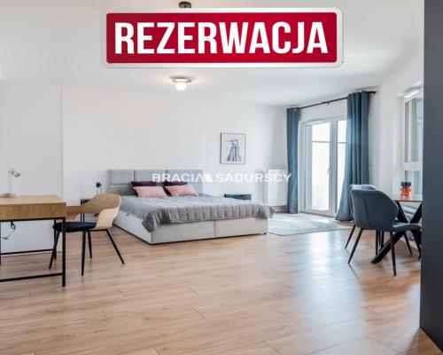 Nowoczesny apartament z balkonem i parkingiem