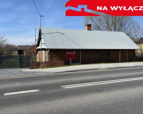 Drewniany dom na działce w Świeciechowie Dużym.