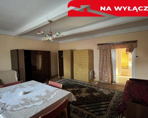 Drewniany dom na działce w Świeciechowie Dużym.