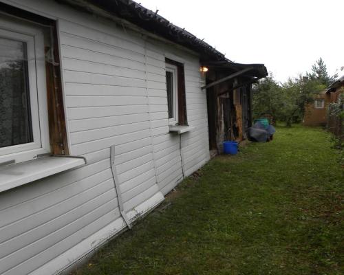 Dom z drewna przy Wiśle ul. Modrzycka w Dęblinie.