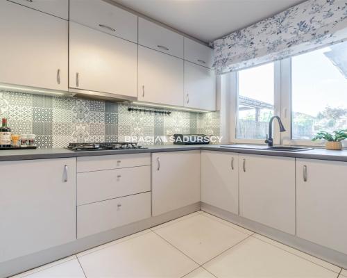 Urokliwa szeregówka w zielonych Krzysztoforzycach