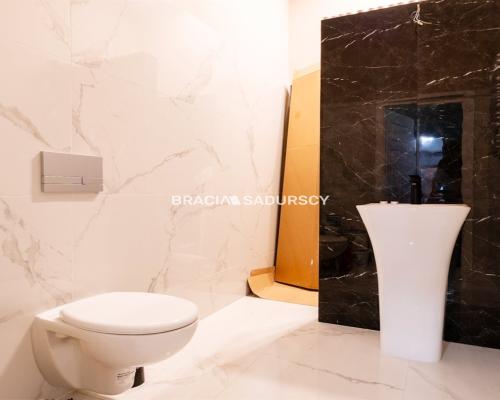 Trzy sypialnie w kamienicy pod Wawelem