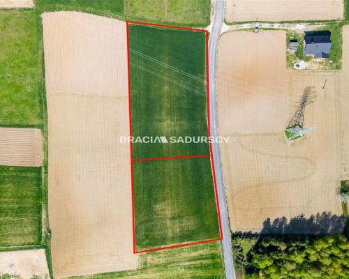 Działka budowlana / 34 + 24 ar