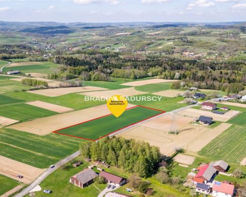 Działka budowlana / 34 + 24 ar