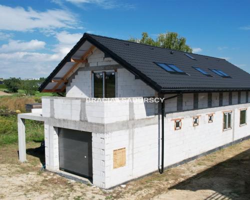 Na sprzedaż: nowoczesny, energooszczędny dom jednorodzinny w Dojazdowie - tuż obok Krakowa.      Agencja nieruchomości Braci