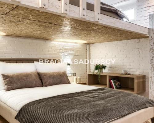 *zdjęcia wykorzystane w ogłoszeniu należą do właściciela.     Na sprzedaż wyjątkowe, nowoczesne mieszkanie z dochodem z najmu