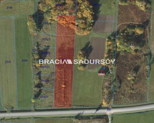 Działka budowlana w Ptaszkowej gm. Grybów      Oferujemy na sprzedaż działkę budowlaną (mieszkaniowo-usługową) o  powi