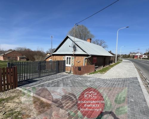 Drewniany dom na działce w Świeciechowie Dużym.