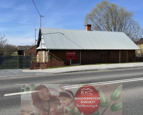 Drewniany dom na działce w Świeciechowie Dużym.