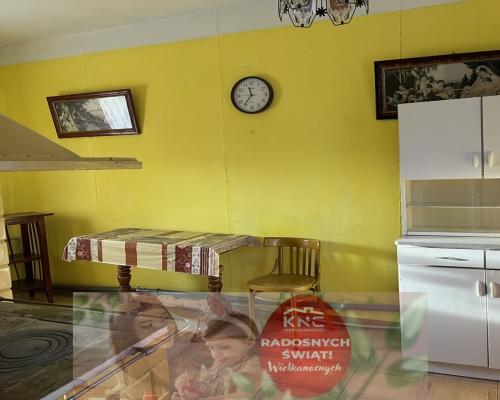 Drewniany dom na działce w Świeciechowie Dużym.