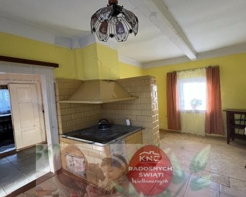 Drewniany dom na działce w Świeciechowie Dużym.