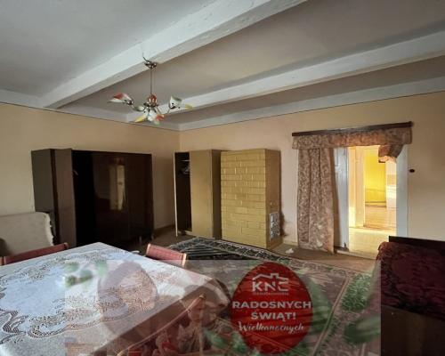 Drewniany dom na działce w Świeciechowie Dużym.