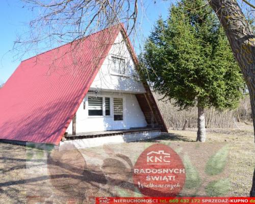 B ładna działka z domkiem letniskowym, własny las.