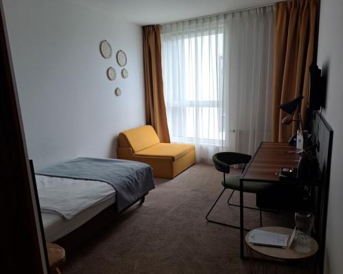 Pokój o pow. 16,26 m2 w hotelu ARCHE w Lublinie.