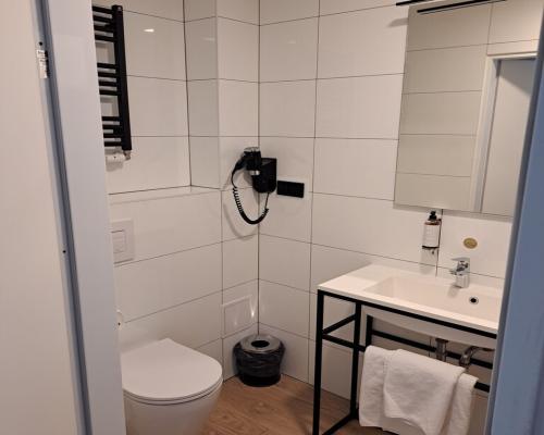 Pokój o pow. 16,26 m2 w hotelu ARCHE w Lublinie.