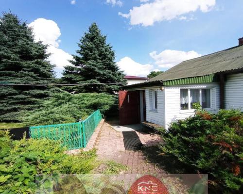 Dom na dużej działce graniczący z rz. Ciemięgą.