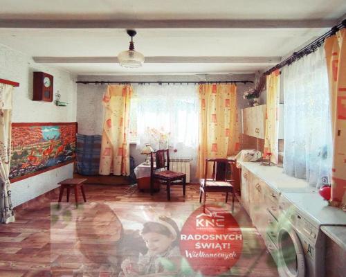 Dom na dużej działce graniczący z rz. Ciemięgą.