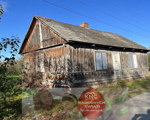 Dom drewniany do remontu na działce w Zakrzowie.