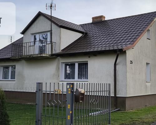 Dom z zabudowaniami na działce 1,24 ha