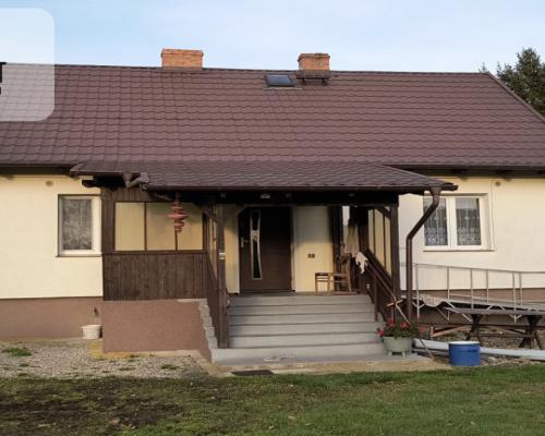 Dom z zabudowaniami na działce 1,24 ha