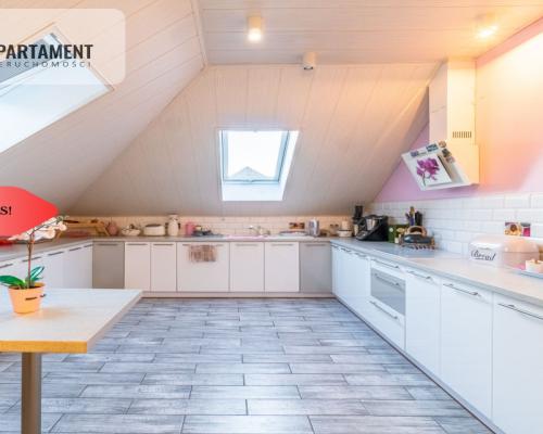 Dom: dwa mieszkania i przestrzeń na działalność