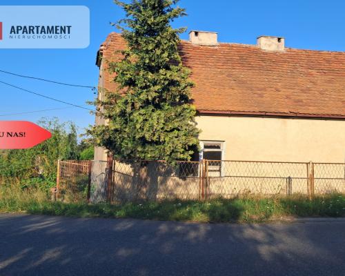 Dom z potencjałem na dużej działce!