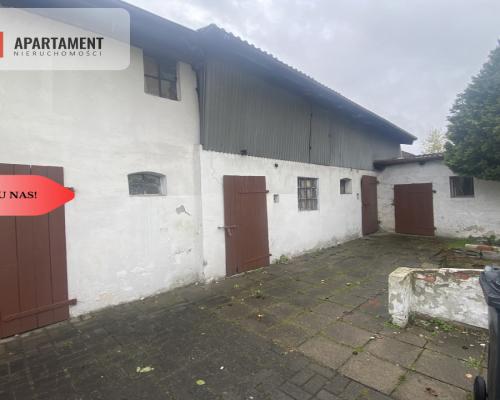 Przestronna kamienica z garażami w mieście