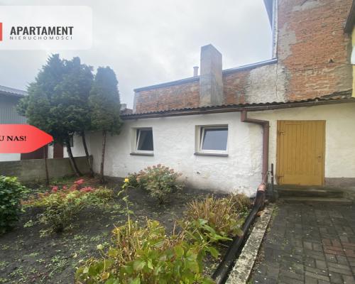 Przestronna kamienica z garażami w mieście