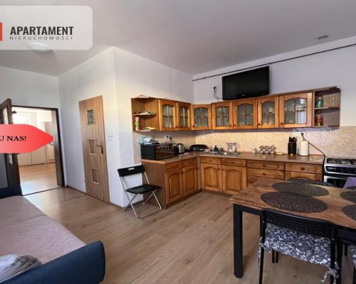 * Kamienica w centrum Kcyni