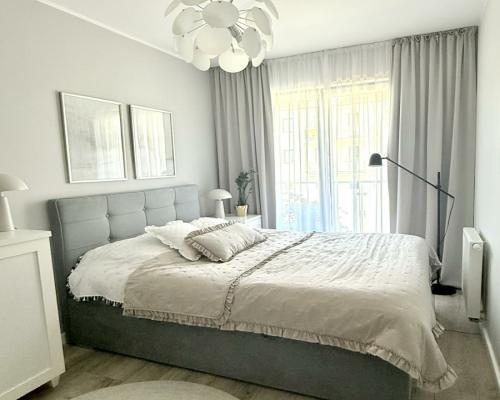 Nowoczesny apartament z dwoma balkonami oraz windą