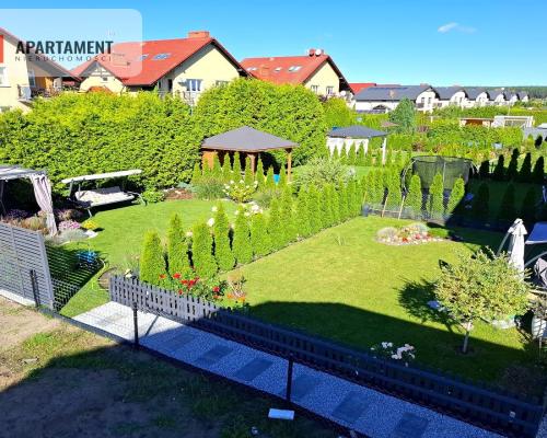 Mieszkanie w czterolokalowym budynku z ogródkiem