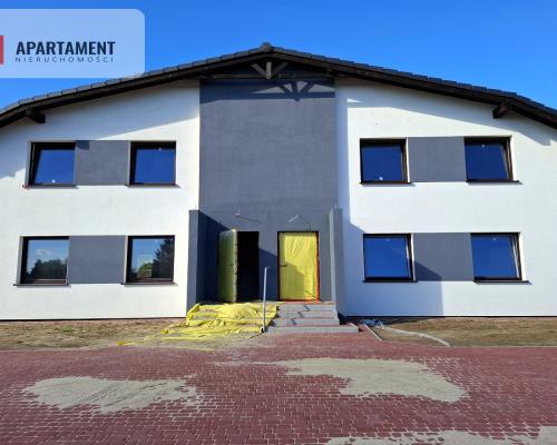 Mieszkanie w czterolokalowym budynku z ogródkiem