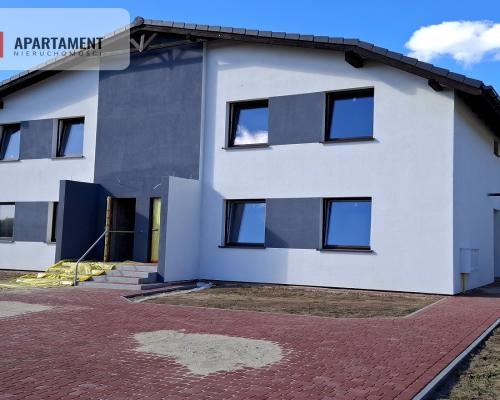 Mieszkanie w czterolokalowym budynku z ogródkiem