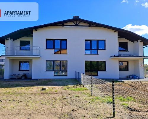 Mieszkanie w czterolokalowym budynku z ogródkiem