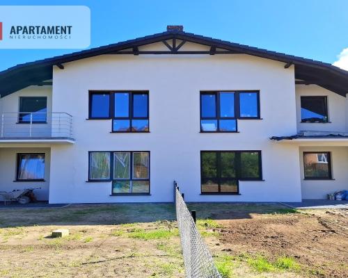 Mieszkanie w czterolokalowym budynku z ogródkiem