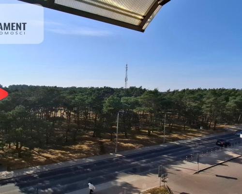 Słoneczna kawalerka z wnęką na Błoniu