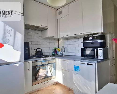 Słoneczna kawalerka z wnęką na Błoniu