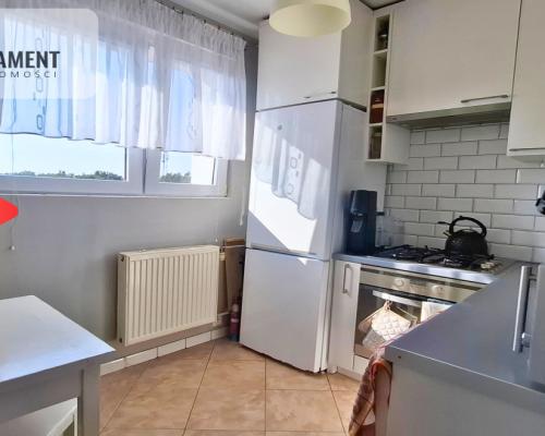 Słoneczna kawalerka z wnęką na Błoniu