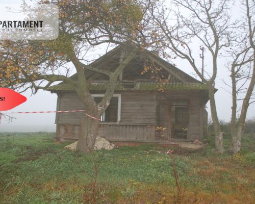 Działka budowlana z zabudowaniami Pigża.