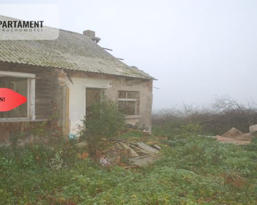 Działka budowlana z zabudowaniami Pigża.