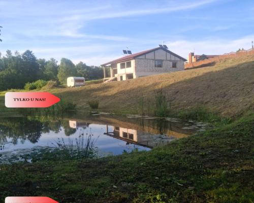 Duża Działka z domem w budowie z dostępem do rzeki