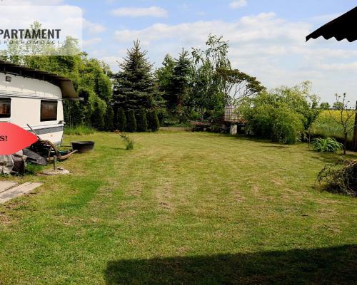 Działka budowlana z prądem, wodą i ogrodzeniem 15a