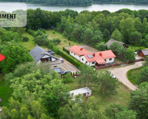 Działka budowlana zadrzewiona las jezioro