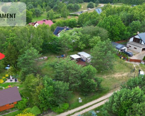 Działka budowlana zadrzewiona las jezioro