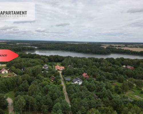 Działka budowlana zadrzewiona las jezioro