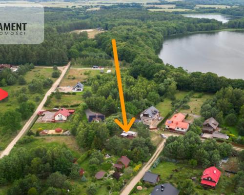 Działka budowlana zadrzewiona las jezioro