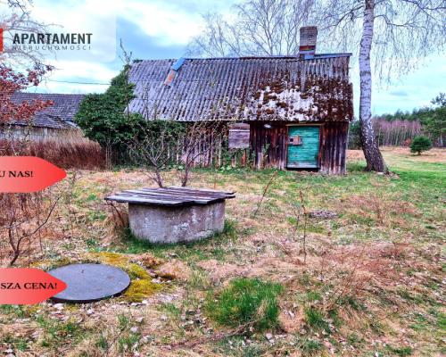 Działka budowlana z drewnianym domkiem.Tylko u nas